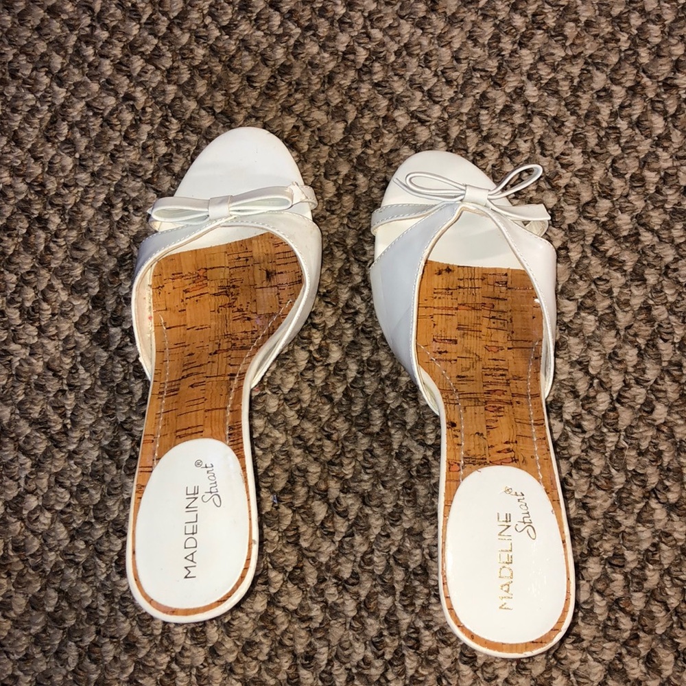 Madeline Stuart heals. Never worn. Size 6